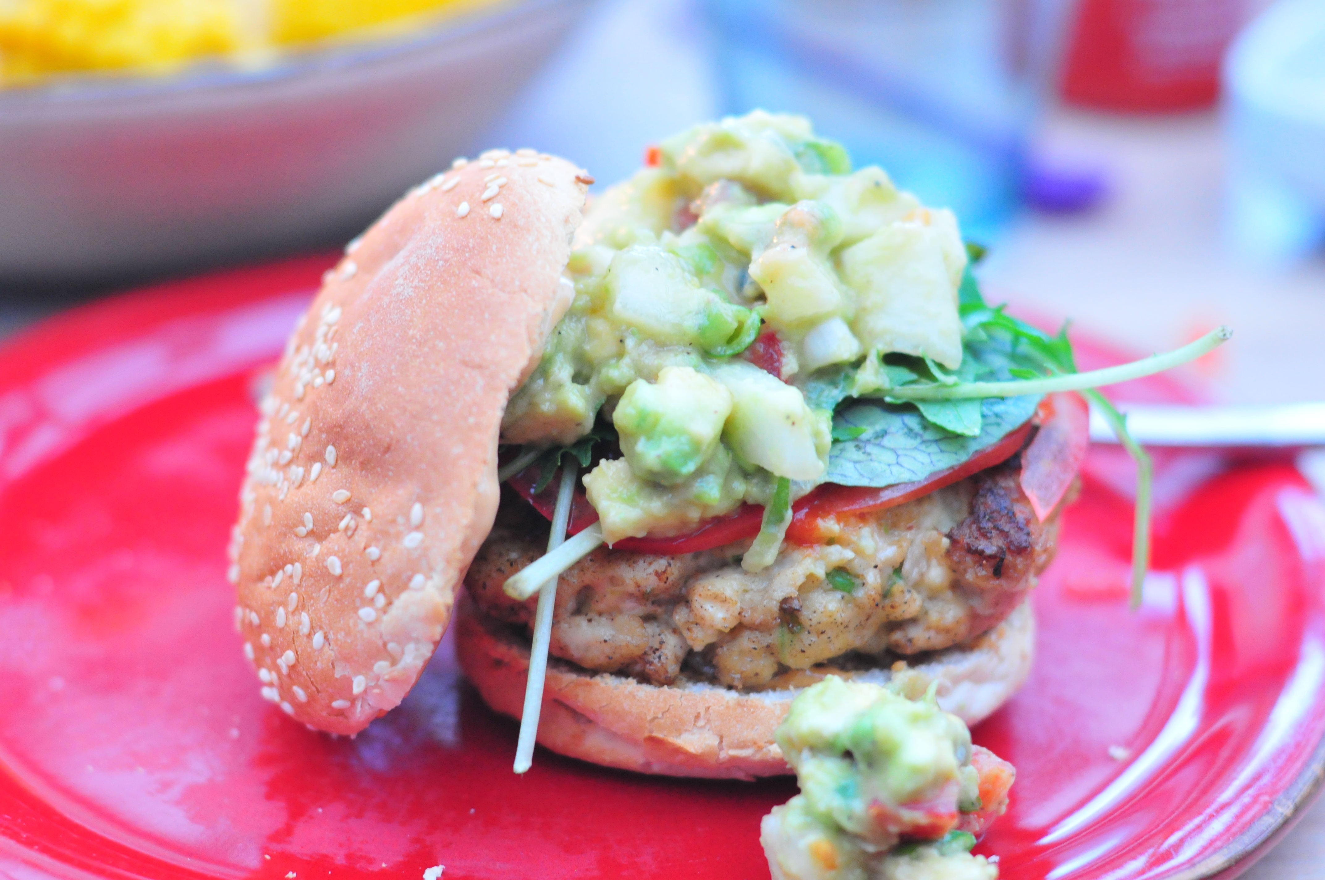 shark burger with potato salad and greens