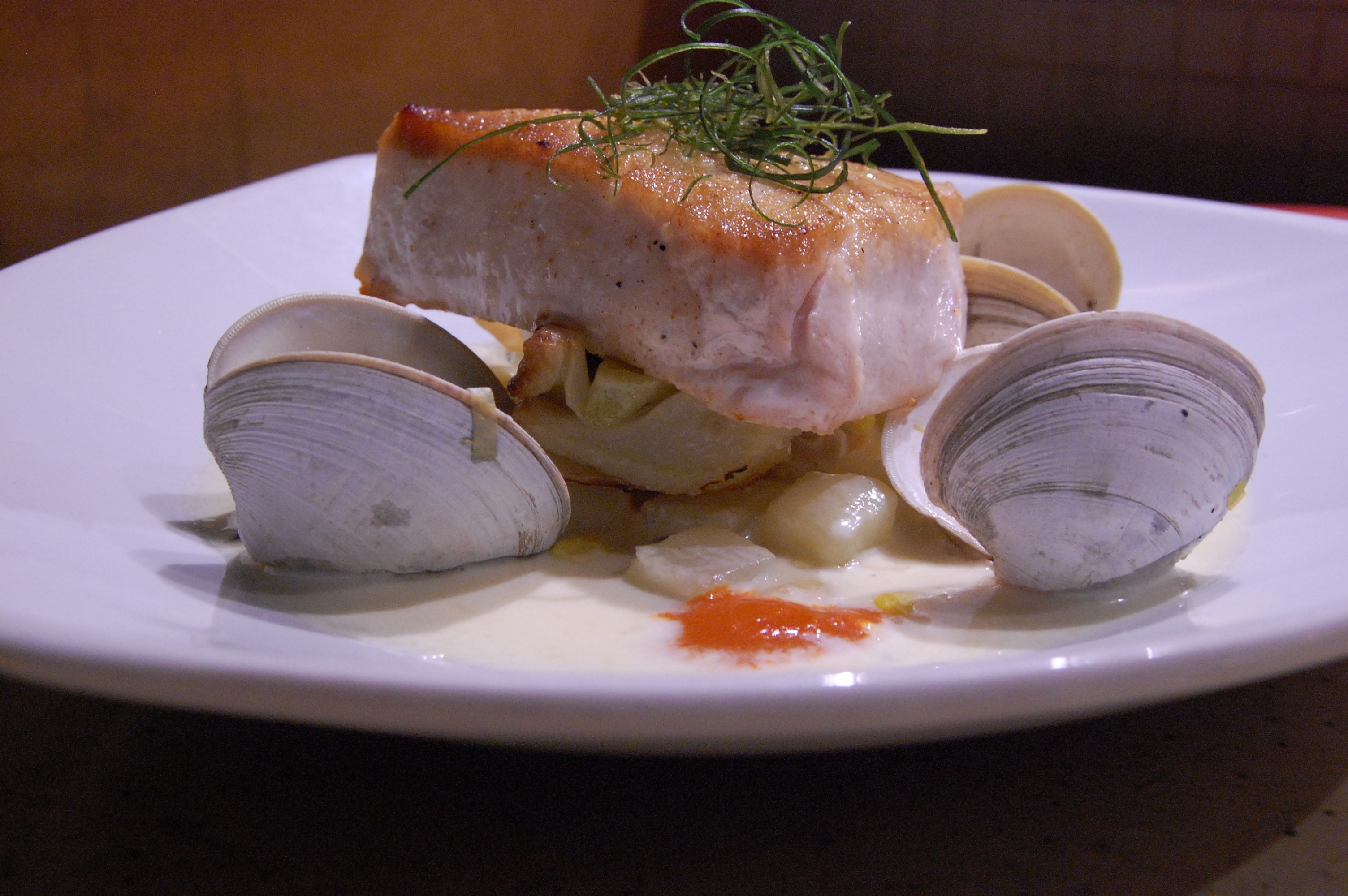 escolar with clams and garnish
