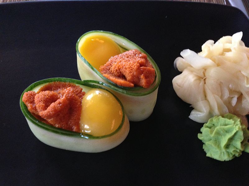 Uni with quail egg sushi