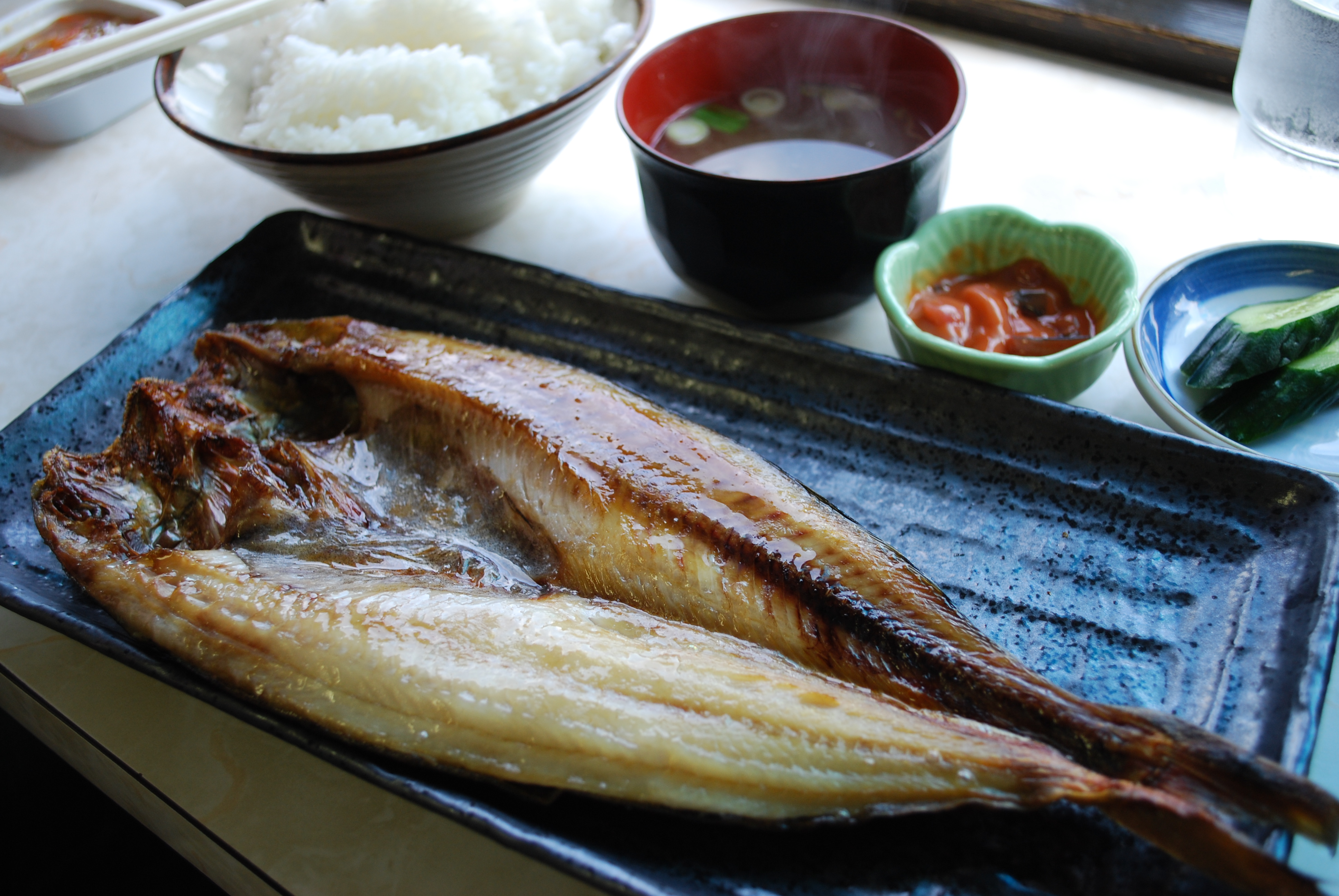 grilled mackerel with rice, miso soup, and vegetable side dishes