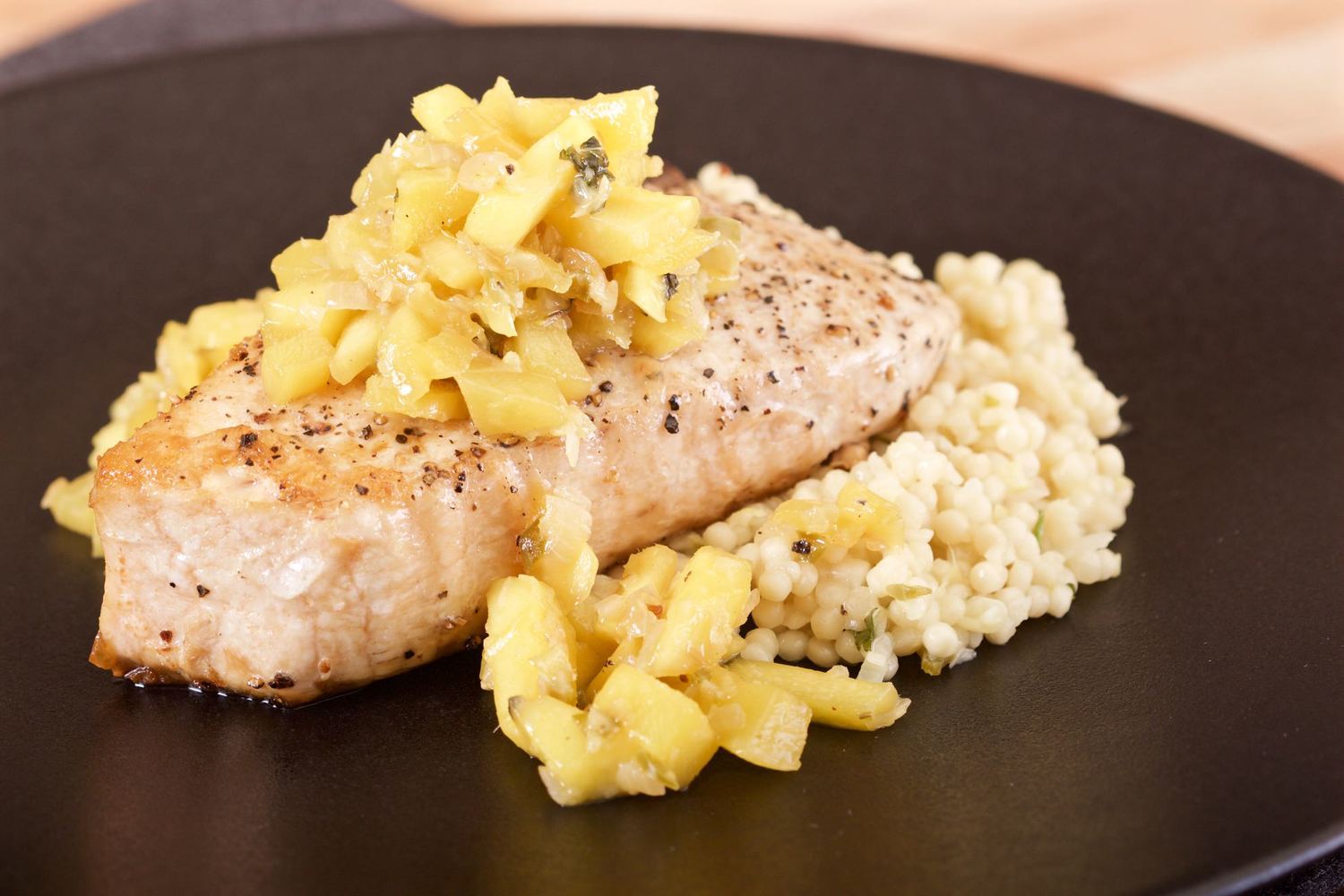 Pan-seared Opah with lemongrass and couscous.