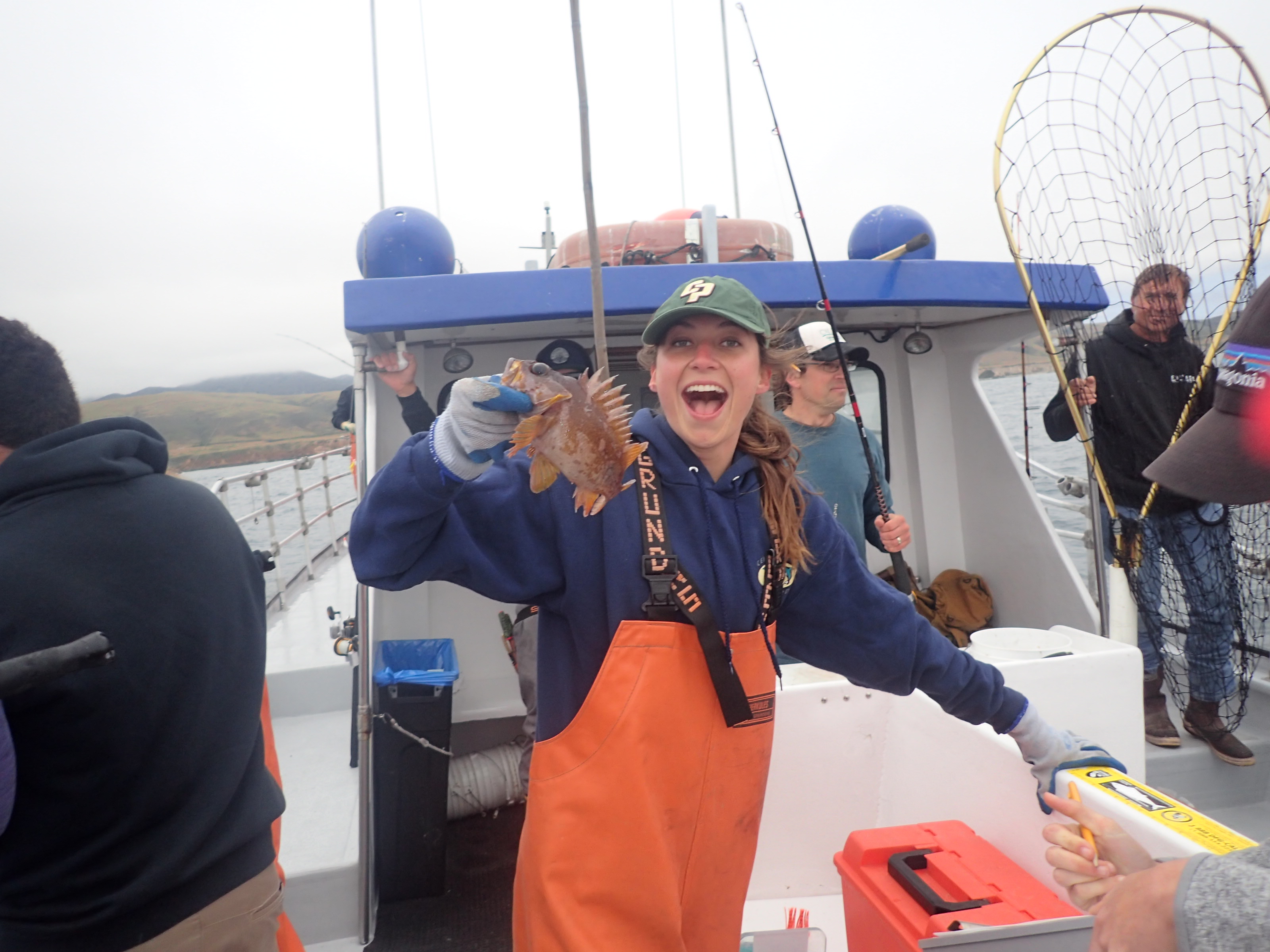 Student Kaleigh Phelps with a tagged cabezon about to be released during MPA monitoring with CCFRP.  Photo courtesy Jennifer O'Leary