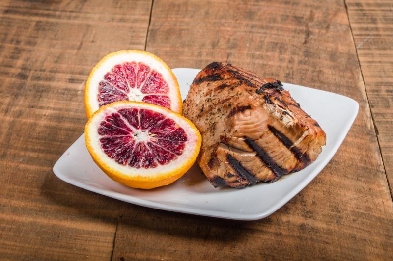 seared fish steak with grapefruit slices