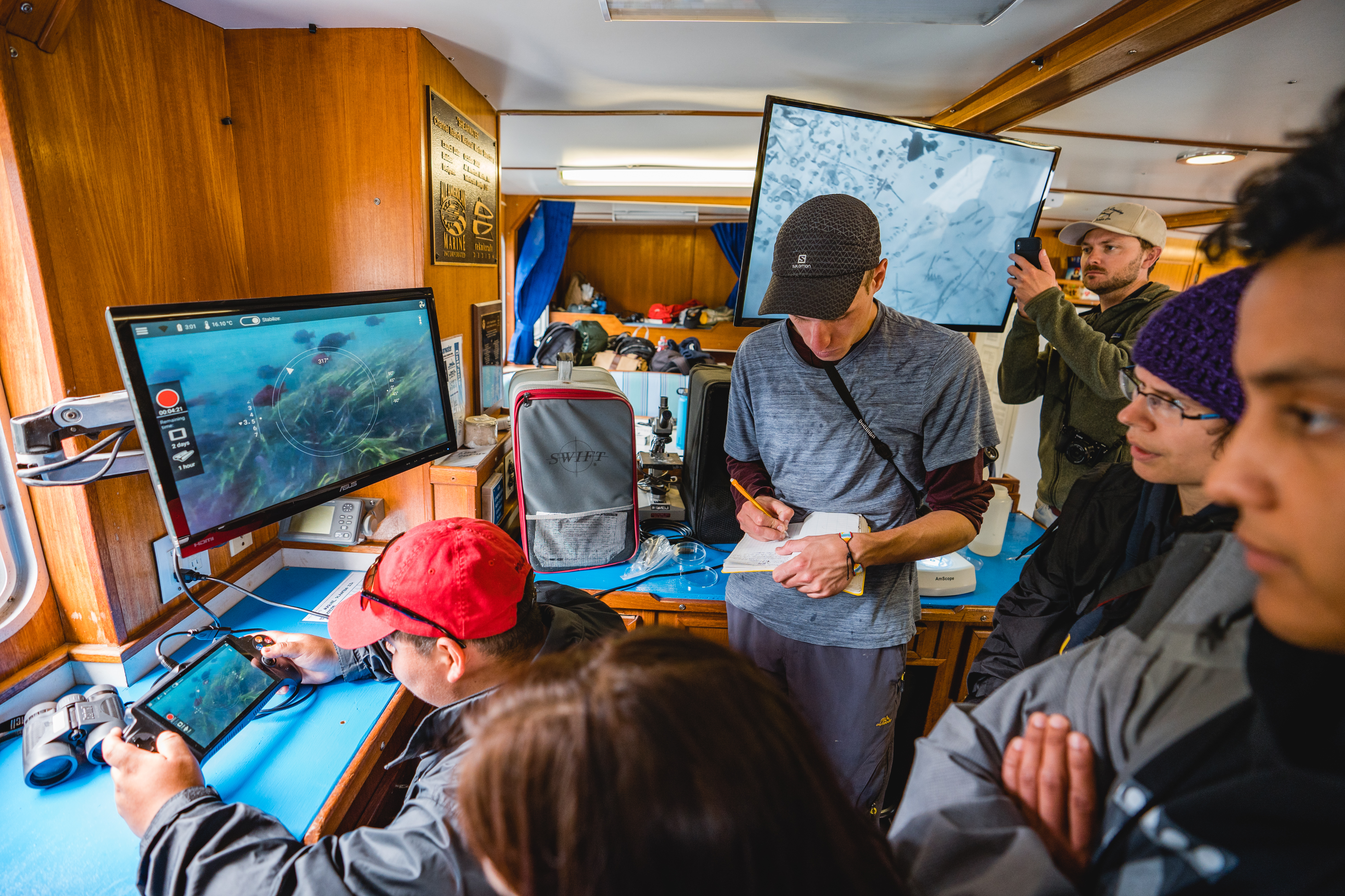 California Sea Grant state fellow Pike Spector demonstrates the nuances of piloting a Trident from the wheelhouse of r/v Shearwater. Students were able to see the pilot’s view of the ROV on a computer monitor mounted in the wheelhouse. Photo credit: Dr. Peavey-Reeves