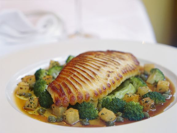 grilled skate wing with potato and broccoli 