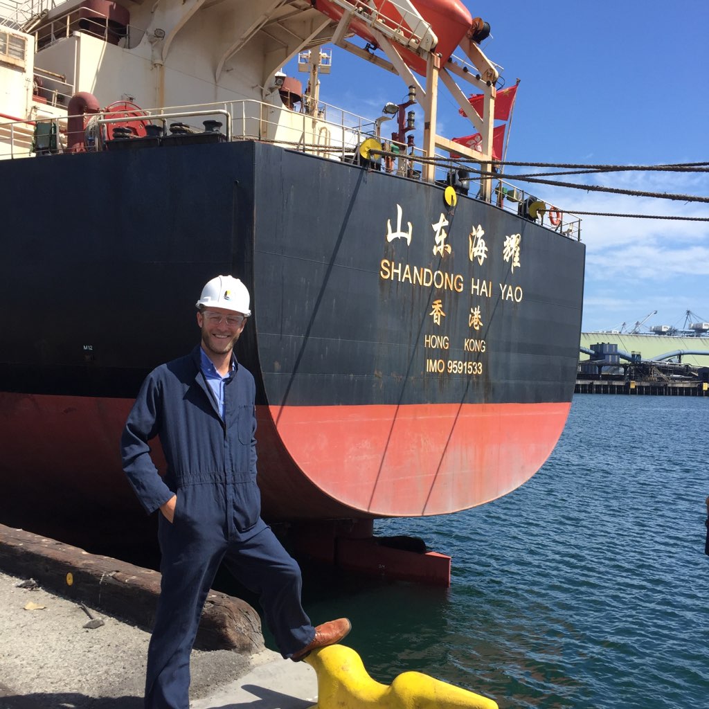 boat docked with sam blakesley in foreground