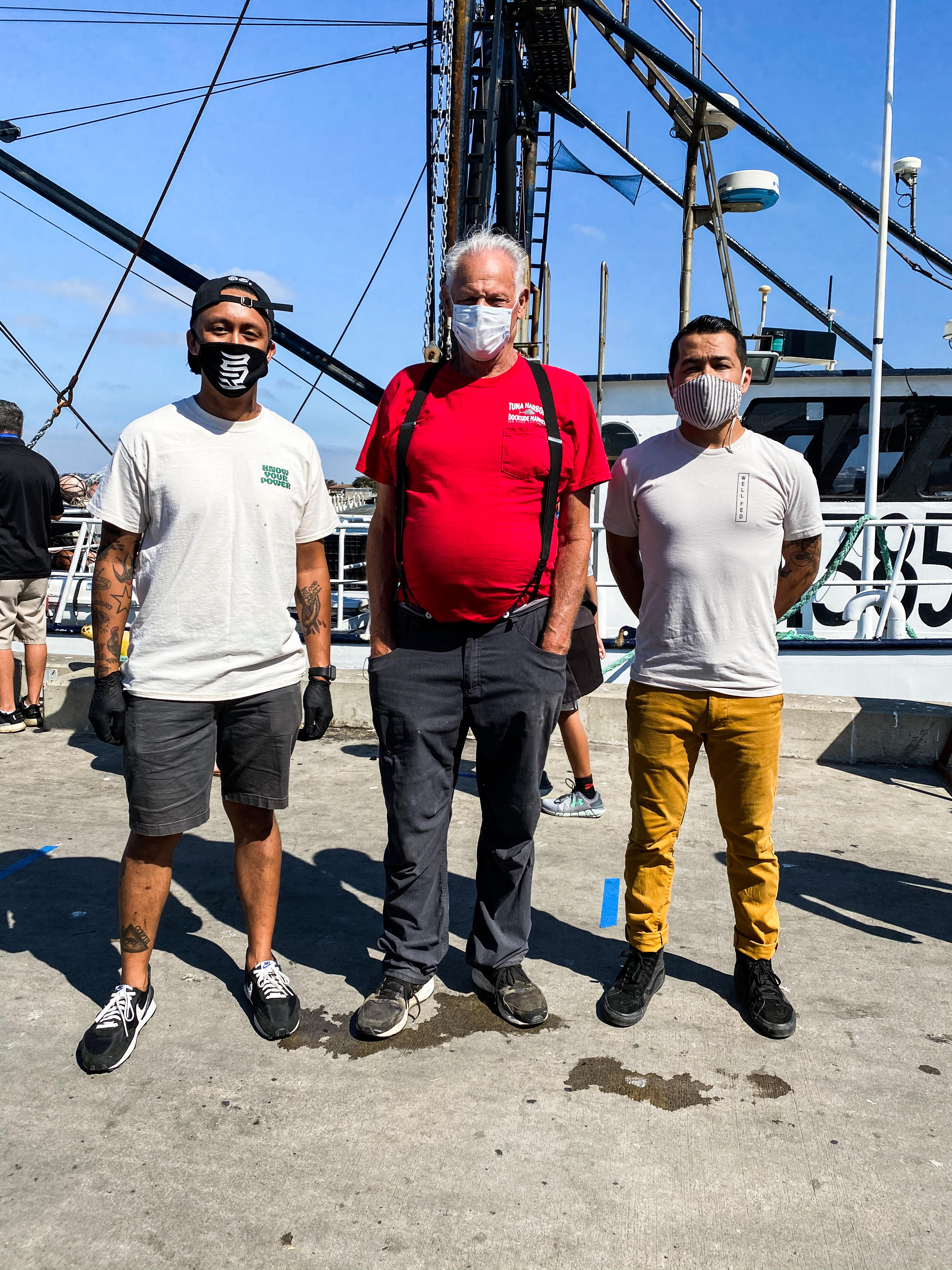 Project leads: Chefs Phillip Esteban and Marcus Twilegar flank San Diego fisherman, Pete Halmay. Photo: Jam Zumel