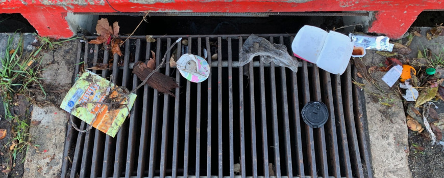 storm drain with trash