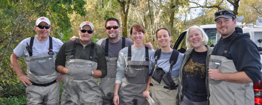 Landowner Sally Weed with members of the coho broodstock program