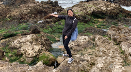 Taking a break from identifying “gray” coastal armoring structures to examine the tide pools in San Mateo County. Photo credit: Amber Anastacio-Roberts