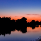 a colorful sunset reflected on the sacramento river