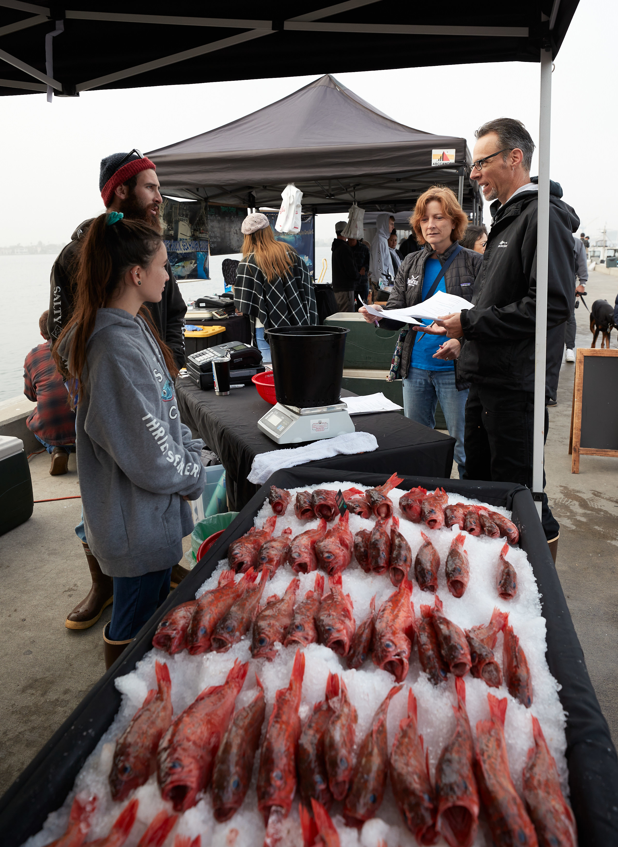 One of the fishing apprentices, Peter, speaks with local commercial fishers.